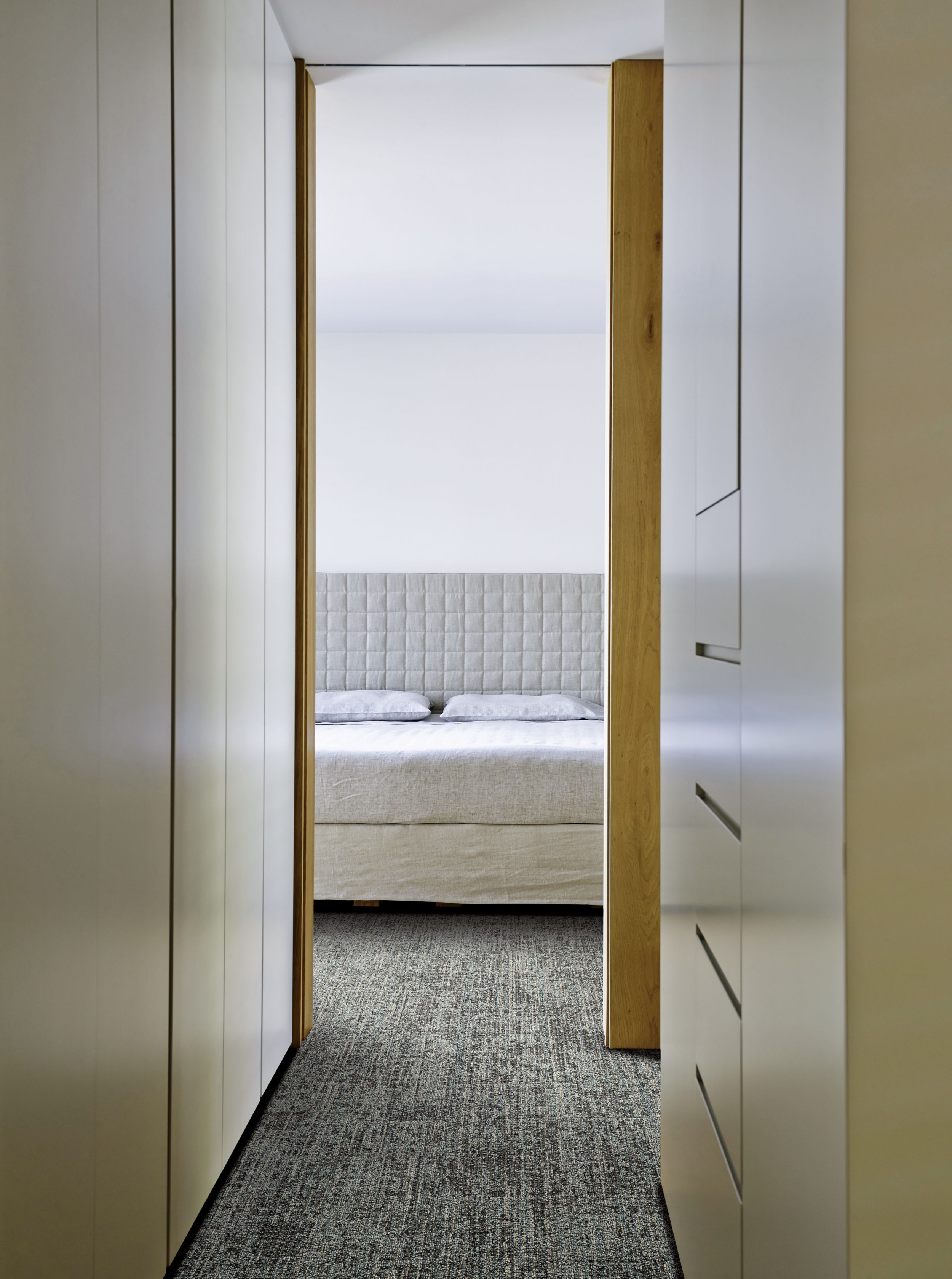 Narrow view off Interface RMS 511 plank carpet tile in hotel guest room image number 1